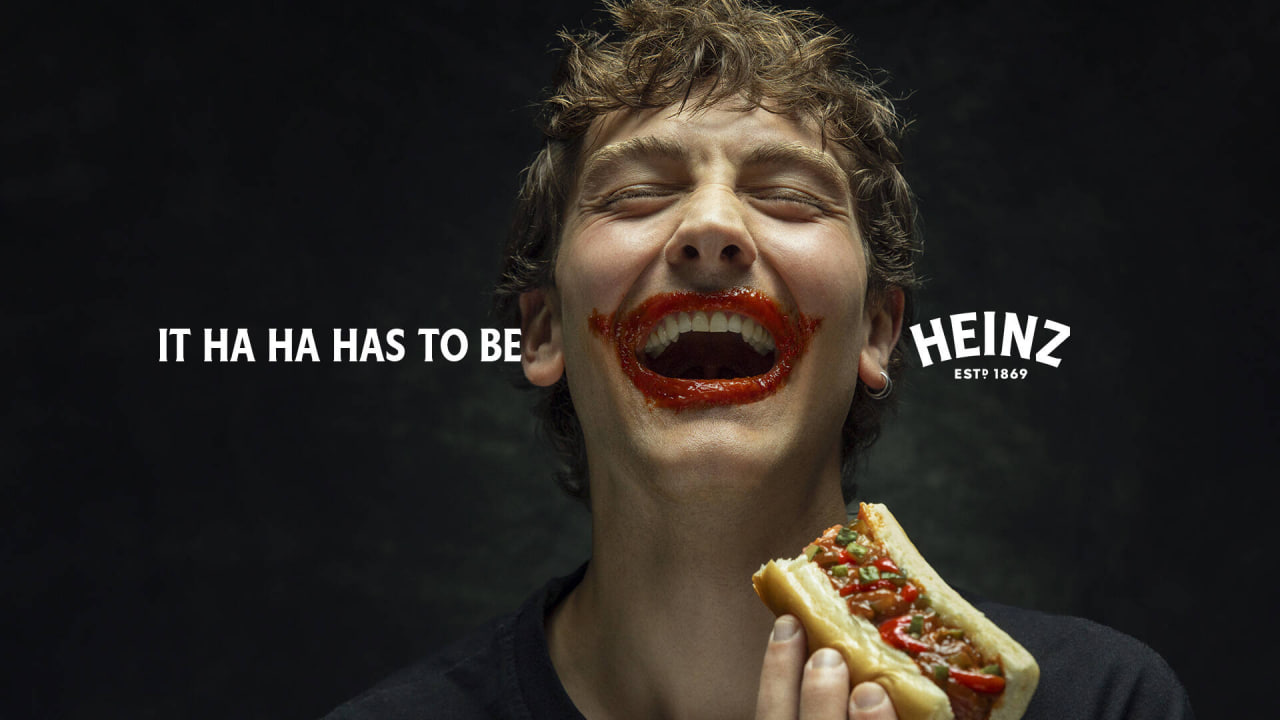 Heinz's bold creation with a big, smudged grin made from ketchup